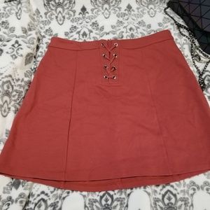 NWOT Burnt Orange Mini Skirt with Lace- up Detail